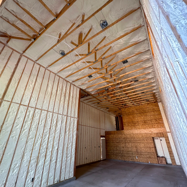 large house with a white insulation installation